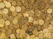 pile of gold round coins
